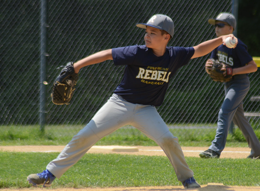 JJ Vazquez pitches for the Pine Bush Rebels during Saturday’s Greater Hudson Valley Baseball League 10U Division 3 playoff game at Pine Bush Town Park.